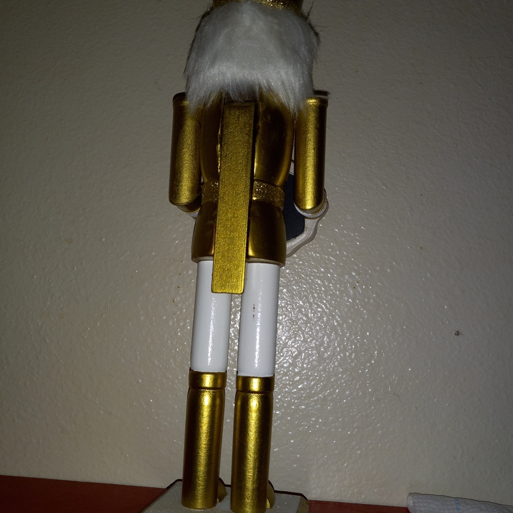 Gold and White Nutcracker Figurine